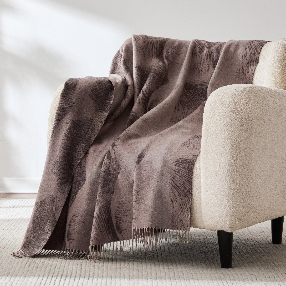 Wool and cashmere throw with a mycelium-inspired pattern
